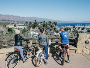 Cal Coast Adventures tour guide showing clients around Santa Barbara on an electric bicycle. 